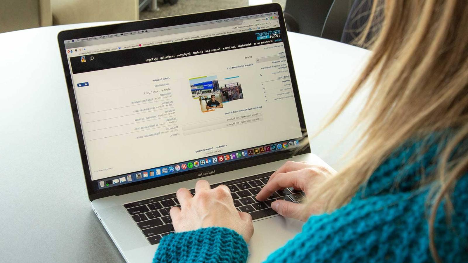 Female student using myTech to register